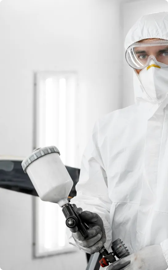A licensed technician inspecting the exterior of a house